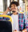 Young man riding a city bus